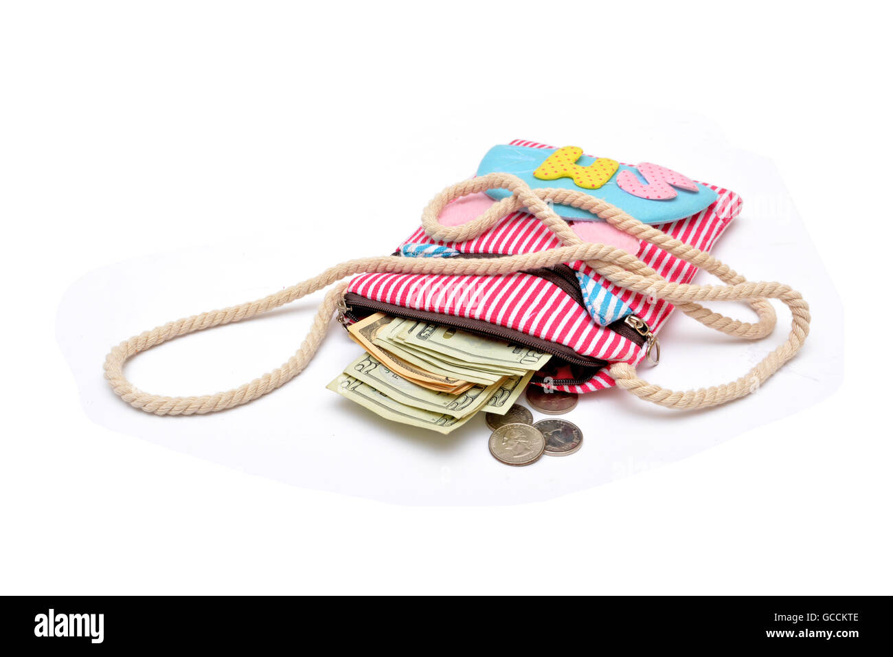 Money coming out of girl hand bag. Stock Photo