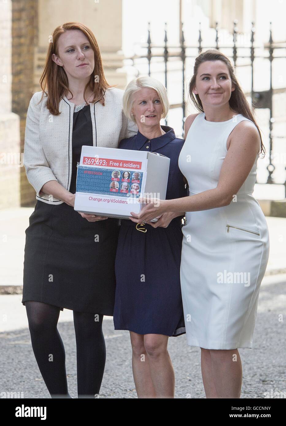(Left to right) Joanne Thomlinson Lisa Dunn and Yvonne MacHugh present a 350,000 signature petition to Downing Street for the release of several British men who have been held in jail in India for firearms charges for the last 1000 days. Stock Photo