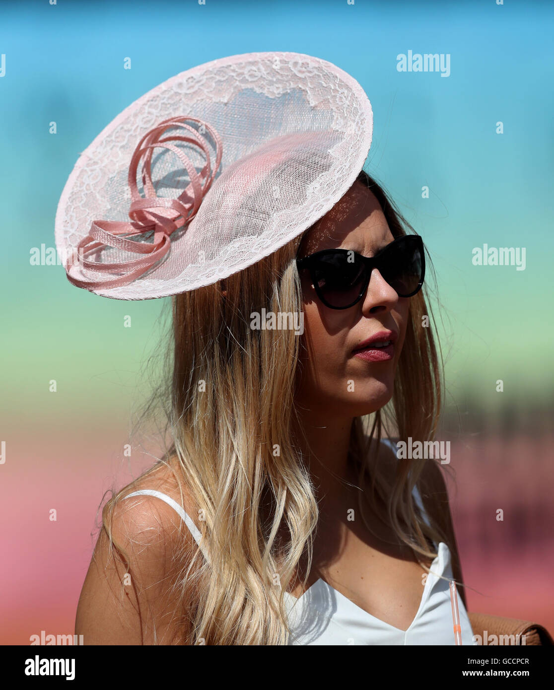 A Racegoer during Gentleman's Day of The Moet & Chandon July Festival at Newmarket Racecourse. Stock Photo