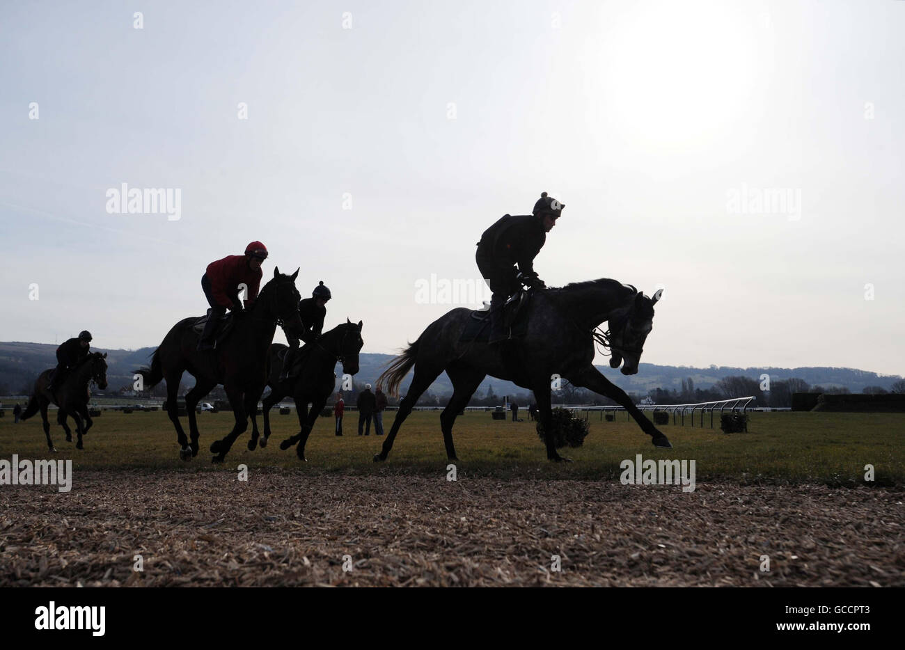 Under clear sky work on the gallops at cheltenham racecourse hi-res ...