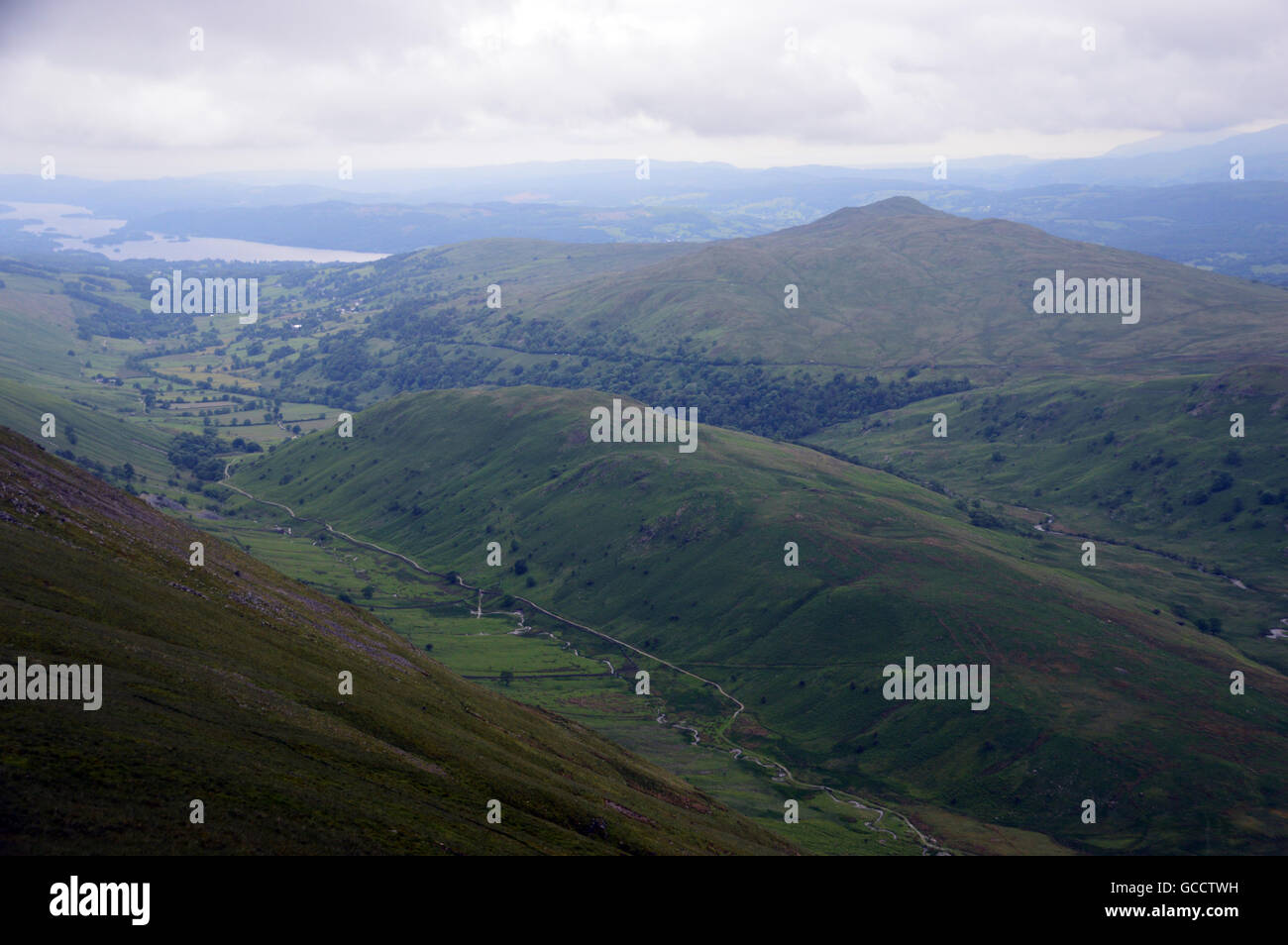 The Troutbeck Valley & the Wainwrights Troutbeck Tongue & Wansfell Pike with Lake Windermere in the Lake District National Park Stock Photo