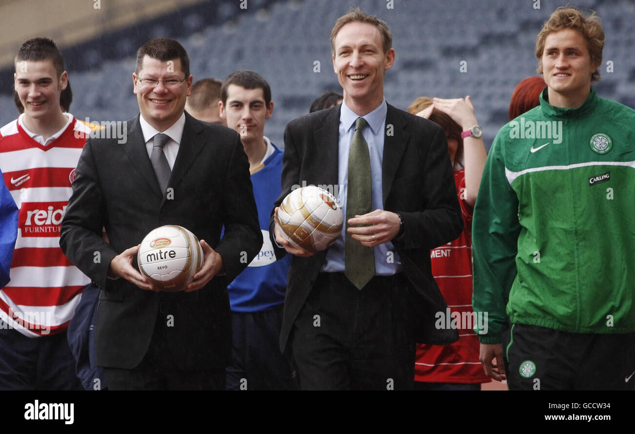 Secretary of State for Scotland Jim Murphy (second right) with Celtic's Thomas Rogne (right) and Scottish Premier League (SPL) Chief Executive Neil Doncaster (second left) during the launch of the Scottish Premier League (SPL)Working Futures scheme as part of the latest round of Labour's Future Jobs Fund, at Hampden Park in Glasgow. Stock Photo