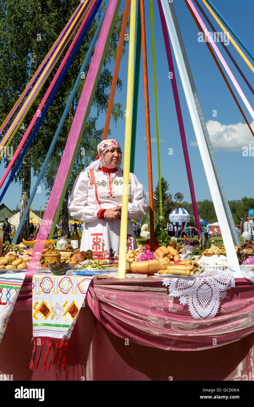 Russians celebrate Sabantuy in 2016 by wearing Bashkir and Tartar ethnic traditional dresses and costumes Stock Photo