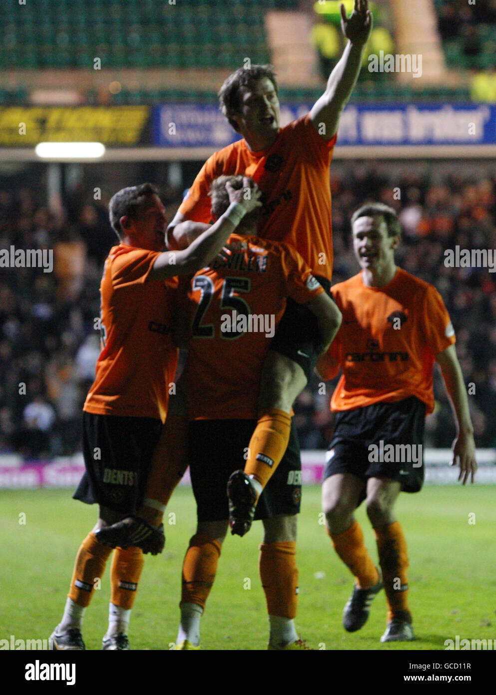 Dundee United's David Goodwillie celebrates the third goal with Jon Daly during the Clydesdale Bank Scottish Premier League match at Easter Road, Edinburgh. Stock Photo