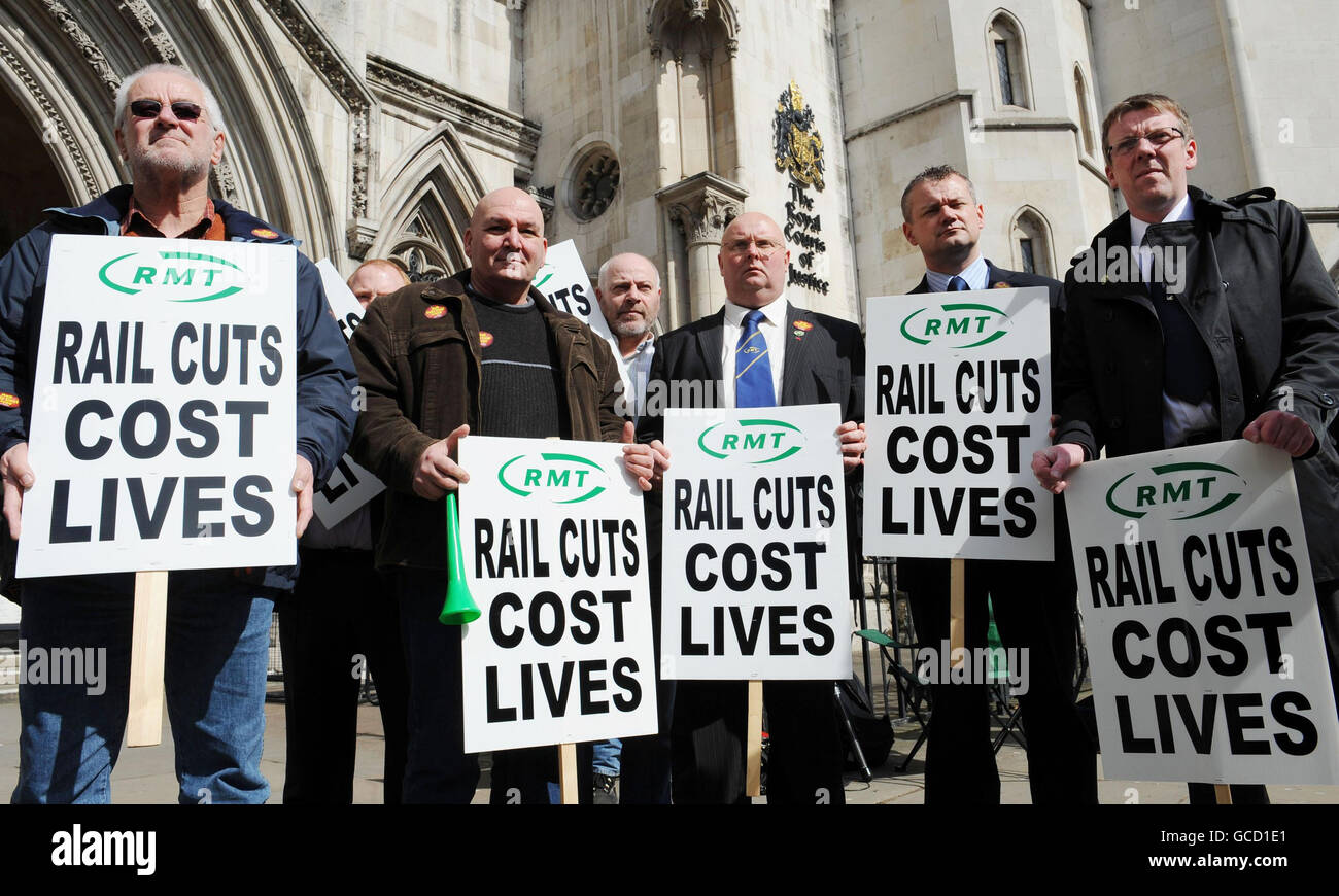 Members of the board of RMT from all around the UK protest at the High Court, London, as Network Rail urged a High Court judge to grant an injunction to block a strike which it says would cause 'immense damage to the economy'. Stock Photo