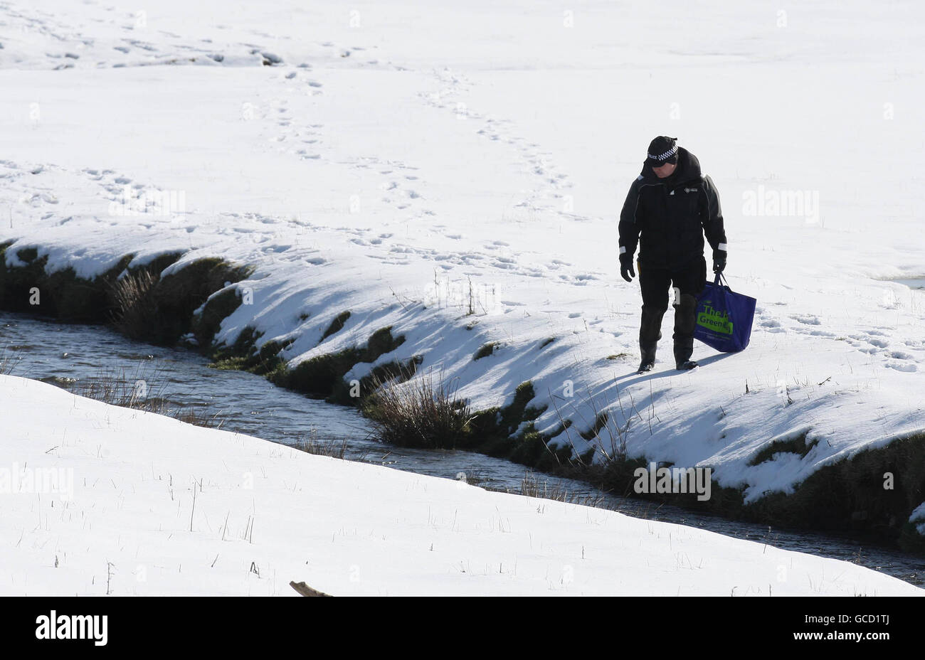 Police scour the river bank for pupils' belongings where Lanark Grammar School pupil Natasha
