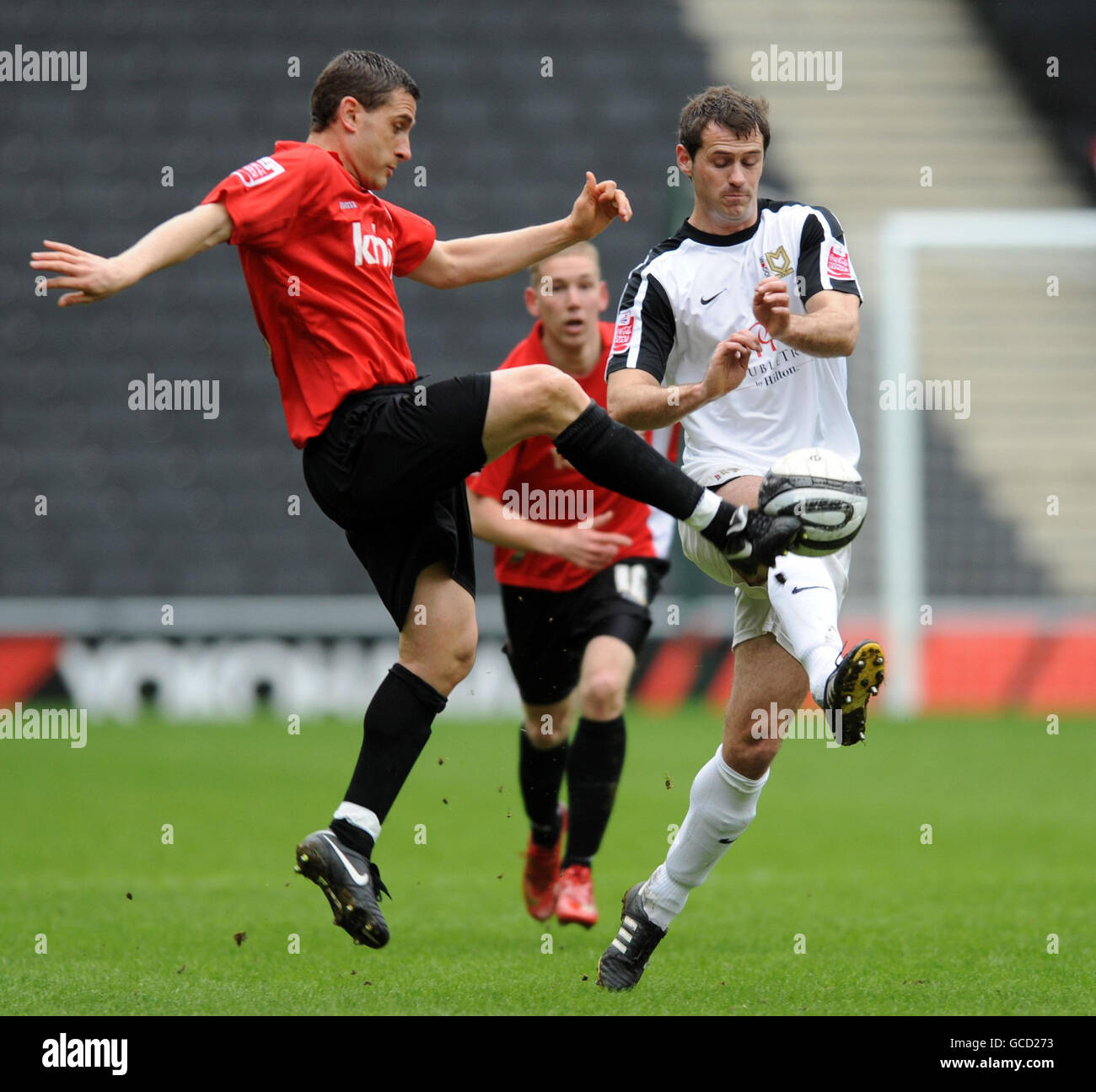 Milton Keynes Dons' David McCracken and Charlton Athletic's Nicky