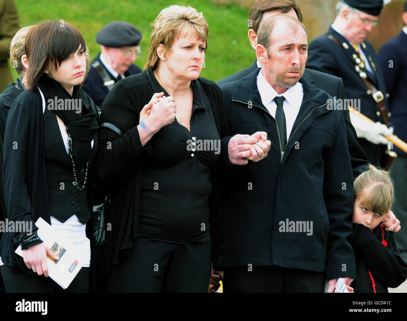 Family members, of Sapper Guy Mellors, 20, from 36 Engineer Regiment, killed while clearing bombs in the north east of Sangin district, Helmand, Afghanistan, last month, (left to right) sister Lana, 14, his mother Linda Holland, step father Bill Holland and his sister Kia ,8, leave Coventry Cathedral following his funeral service. Stock Photo