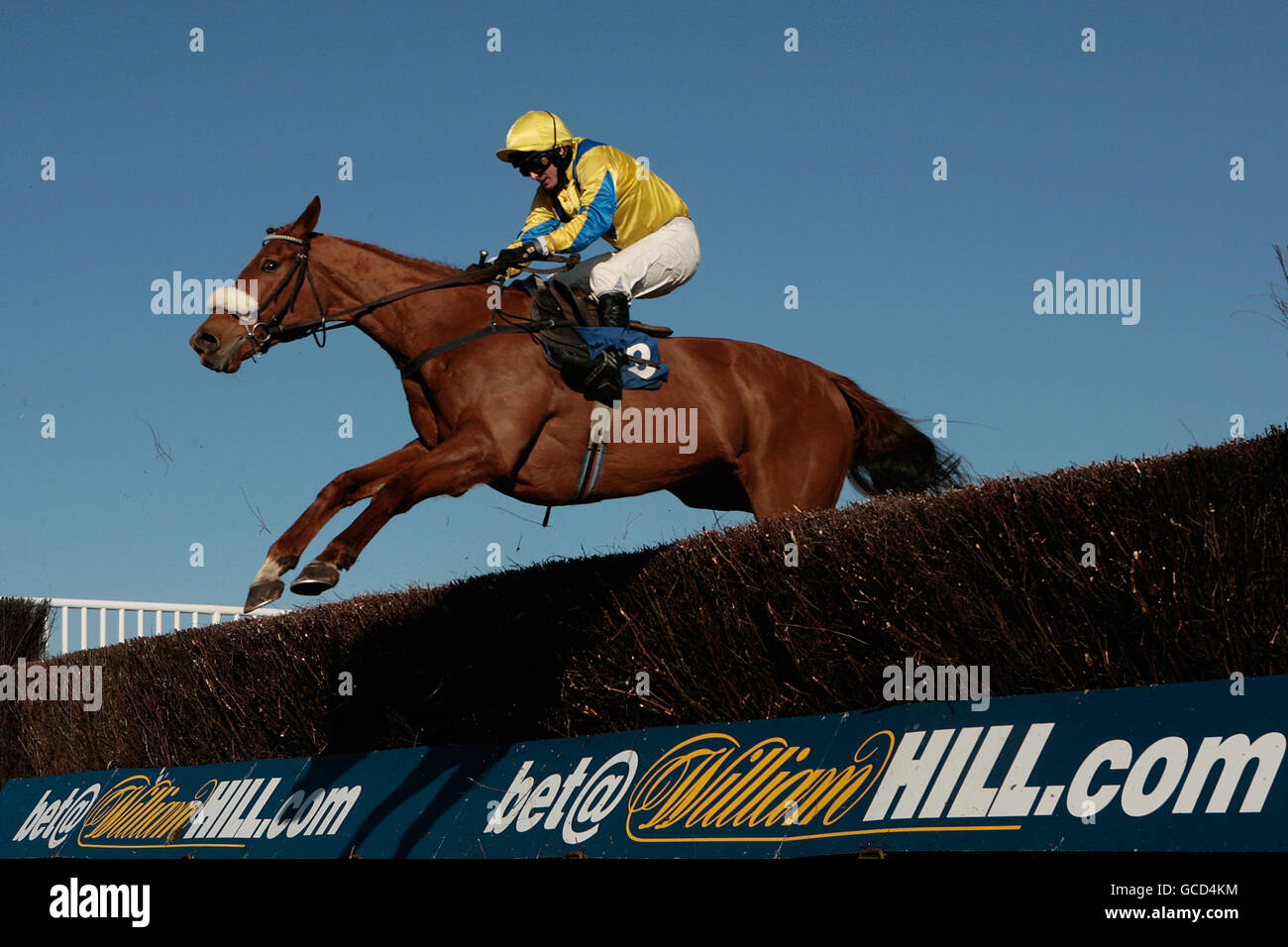 Horse Racing - Celtic Day - Ffos Las Racecourse. Jockey Paul Maloney on Tempting Paradise jumps the last in the Absolute Marquees Handicap Steeple Chase Stock Photo