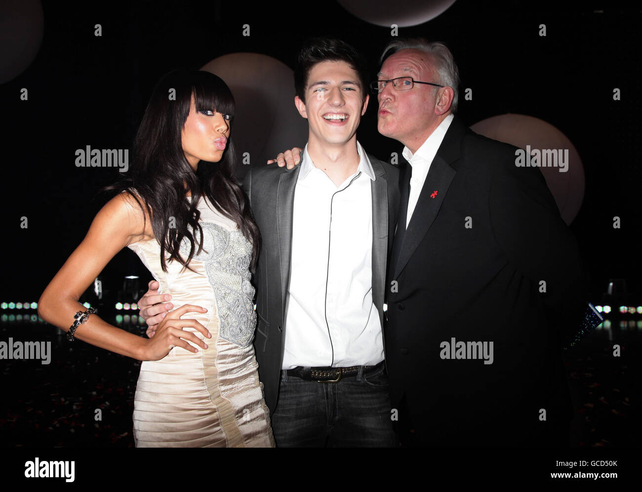 Judges Pete Waterman and Jade Ewen congratulate Josh Dubovie, 19, from Basildon, who won BBC1's 'Eurovision: Your Country Needs You' to represent the UK with the Mike Stock and Pete Waterman penned song 'That Sounds Good To Me' at the Eurovision Song Contest, filmed at BBC TV Centre in west London. Stock Photo