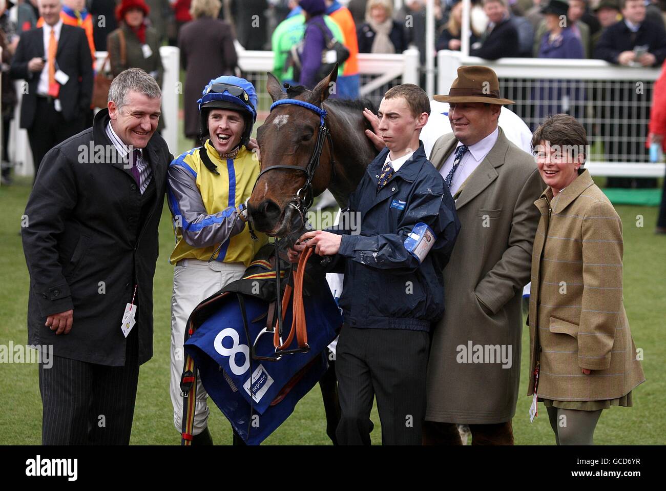 Jason Maguire (second left) celebrates winning the Neptune Investment