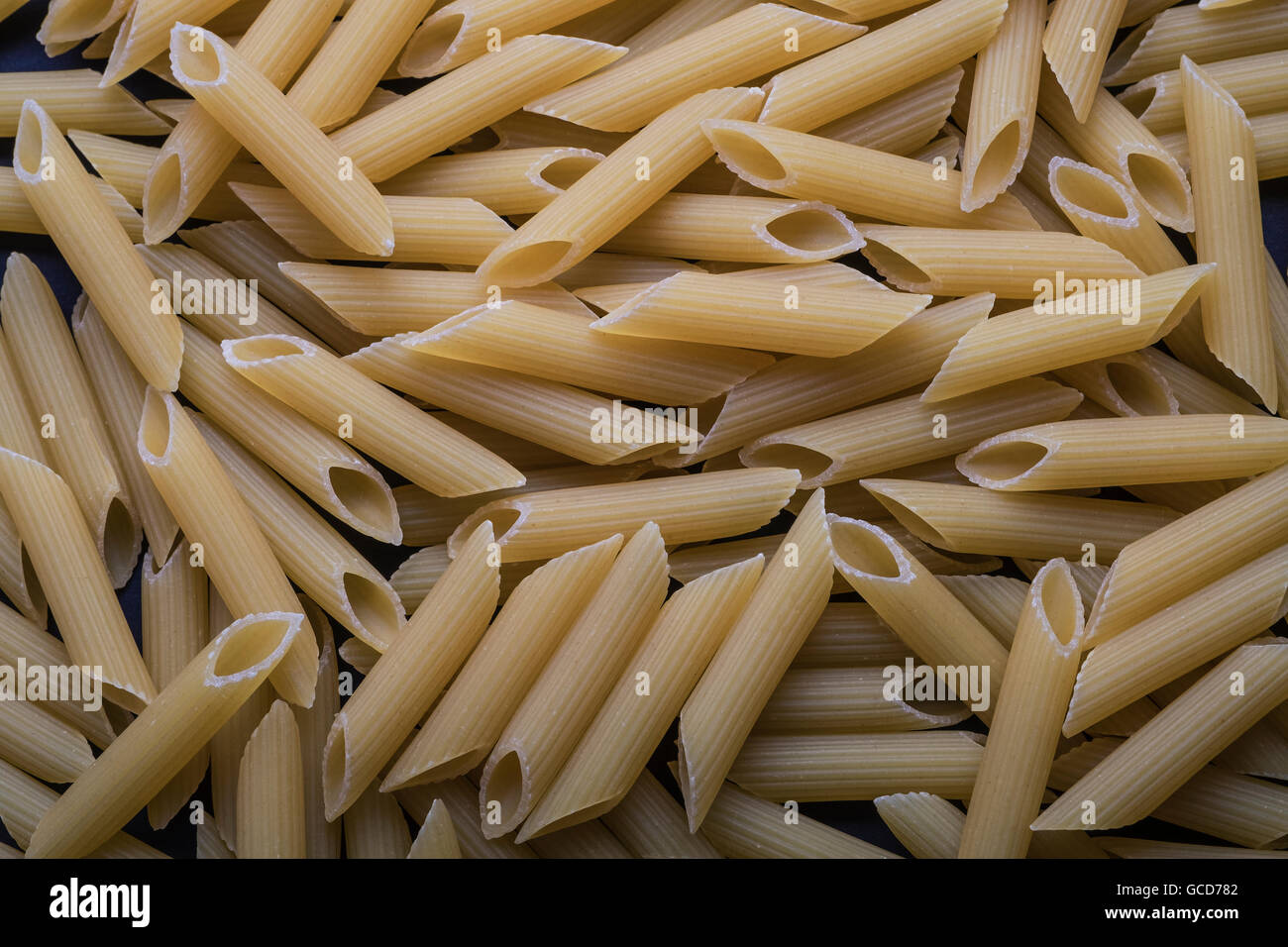 wheat pasta tubes closeup Stock Photo