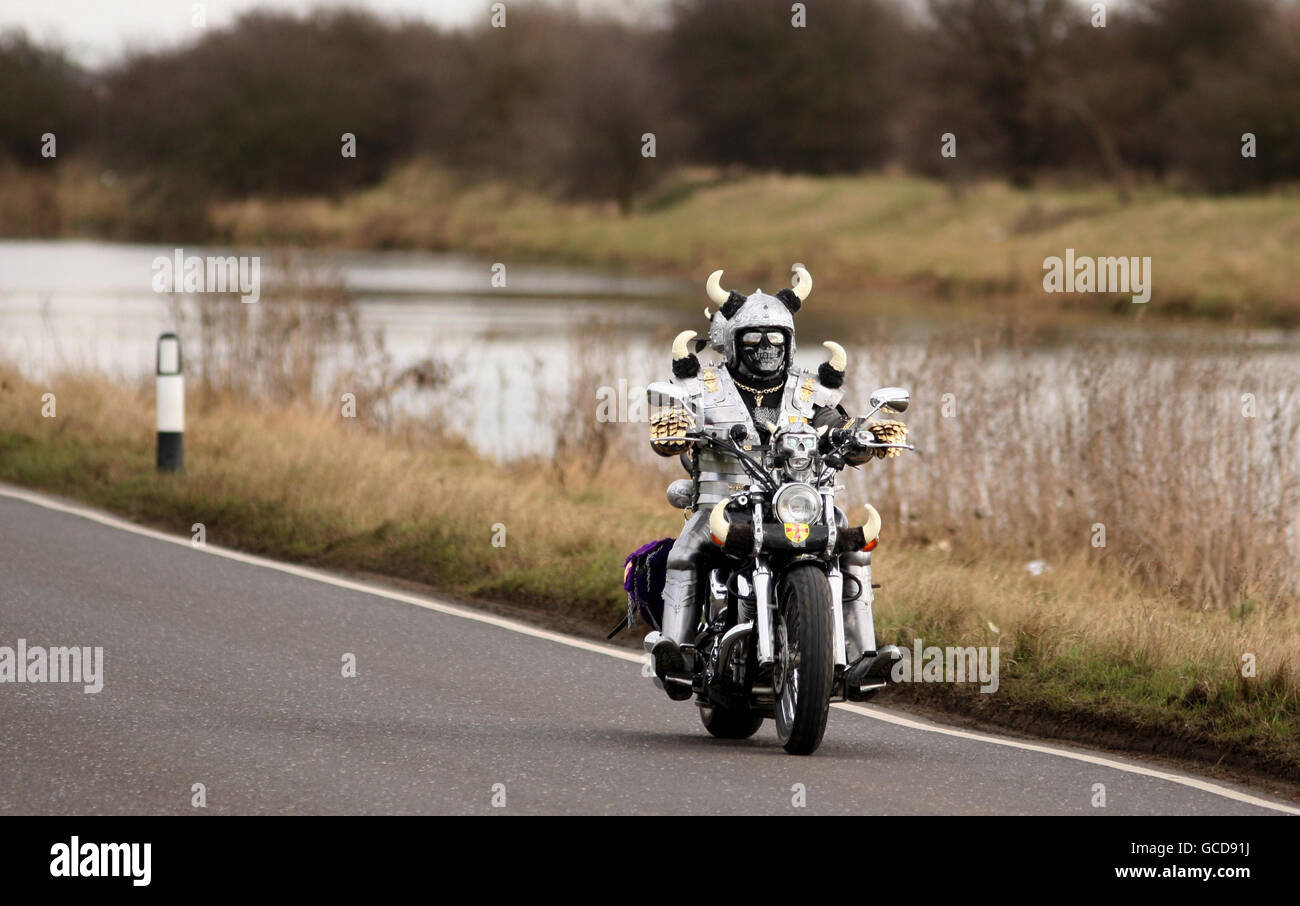 Mark Slater, aka ' Viker Biker', from Peterborough, Cambridgeshire, rides his Yamaha DragStar XVS 1100, through Whittlesey in Cambridgeshire. Stock Photo