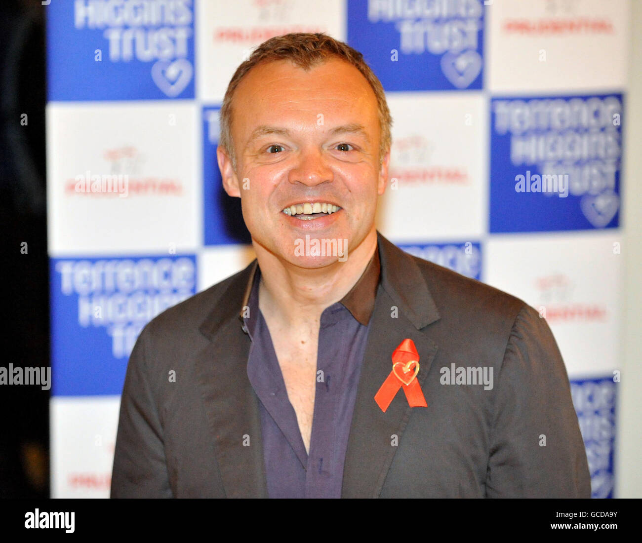 TV Presenter Graham Norton arrives for the Terrence Higgins Trust Lighthouse charity auction, at Christie's in London. Stock Photo