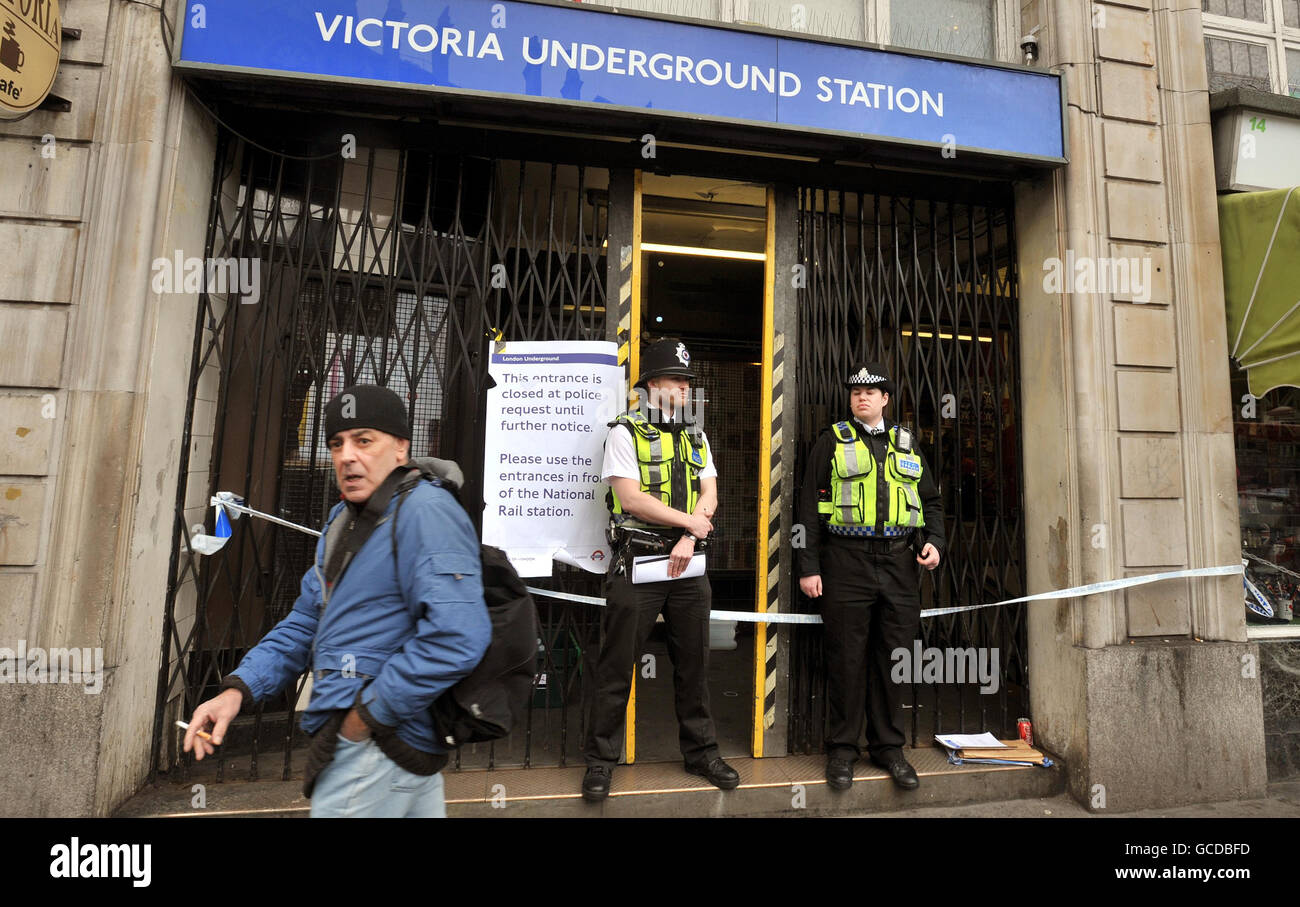 British Transport police at an entrance to Victoria underground station, where a 15-year-old boy was chased before being savagely murdered by a mob of schoolboys. Stock Photo