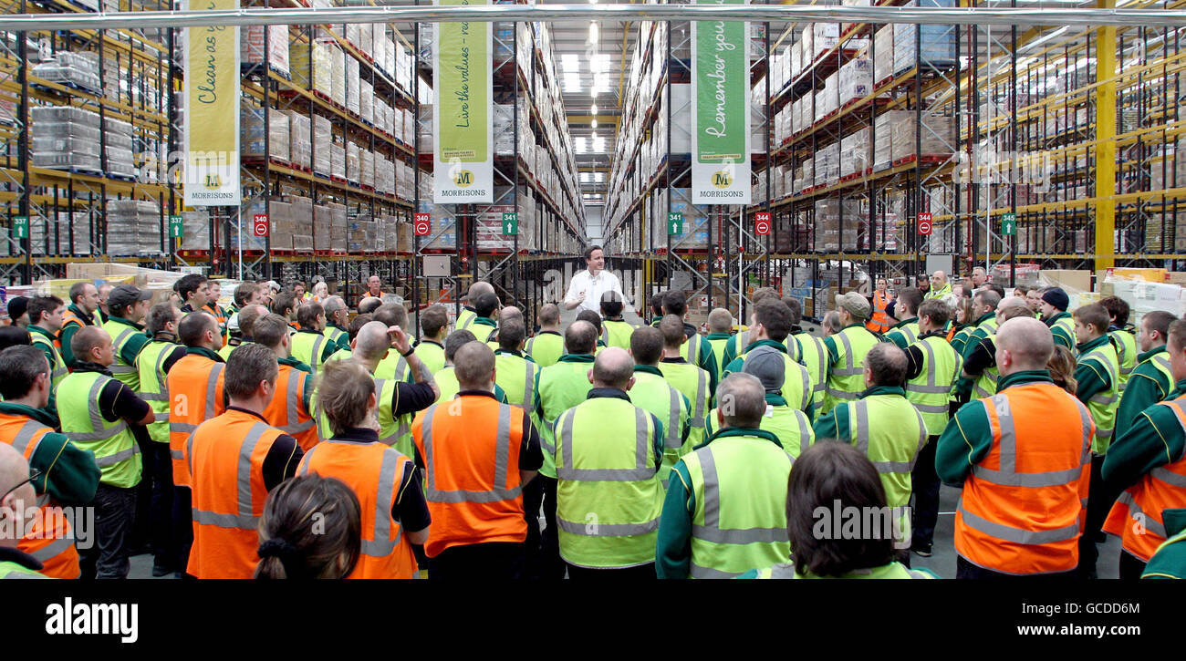 Conservative party leader David Cameron addresses staff during a visit to the Morrisons