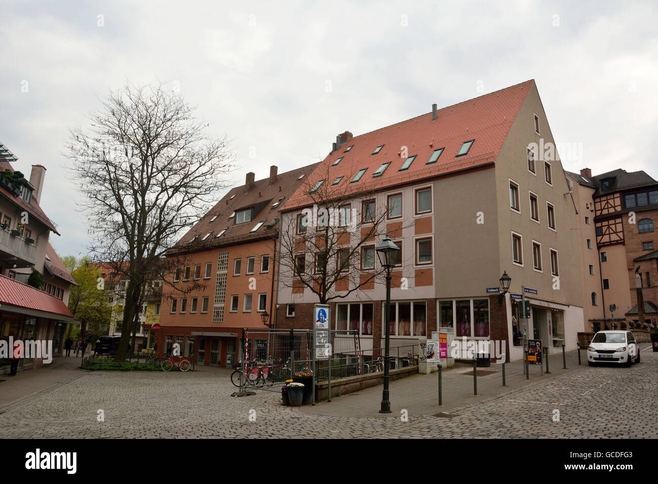 Residential and commercial building on the intersection of Trodelmarkt and An Der Karlsbruc Stock Photo
