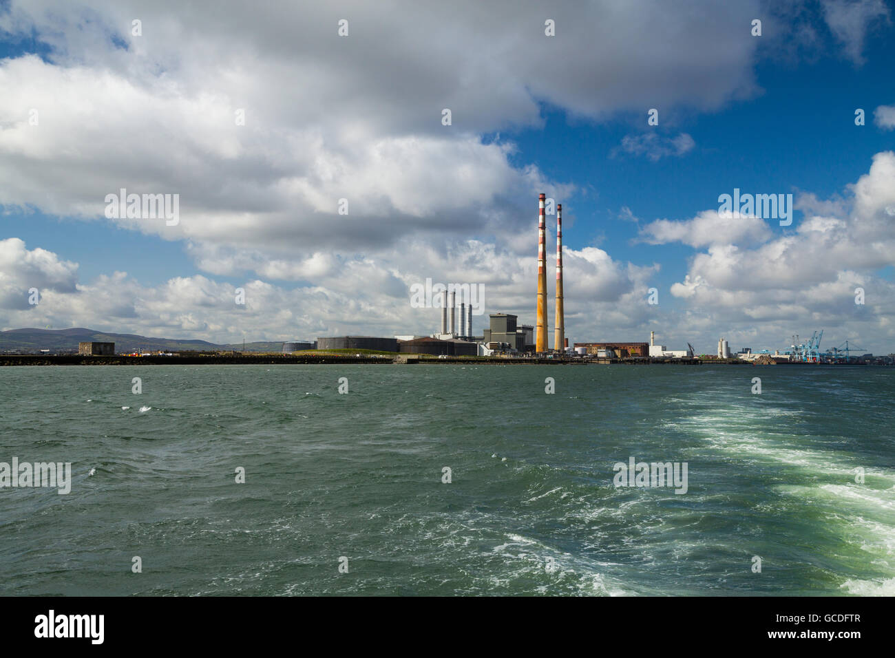 The Poolbeg chimneys viewed from a boat in Dublin bay, Dublin, Ireland