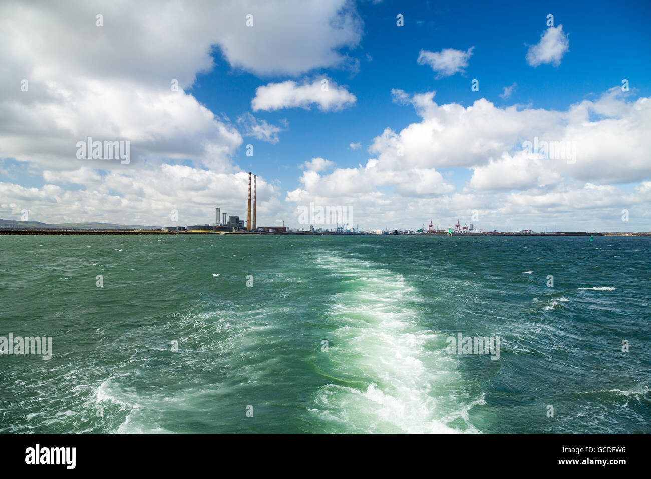 The Poolbeg chimneys viewed from a boat in Dublin bay, Dublin, Ireland