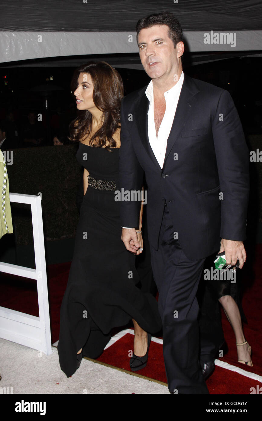 Simon Cowell and Mezhgan Hussainy arriving for The 18th annual Elton John AIDS Foundation Party to celebrate the 82nd Academy Awards at the Pacific Design Center in Los Angeles. Stock Photo