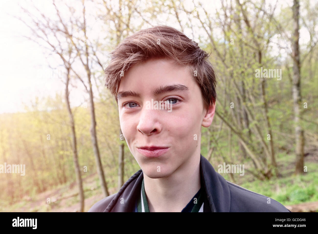 close up portrait of a smiling teenage boy Stock Photo - Alamy
