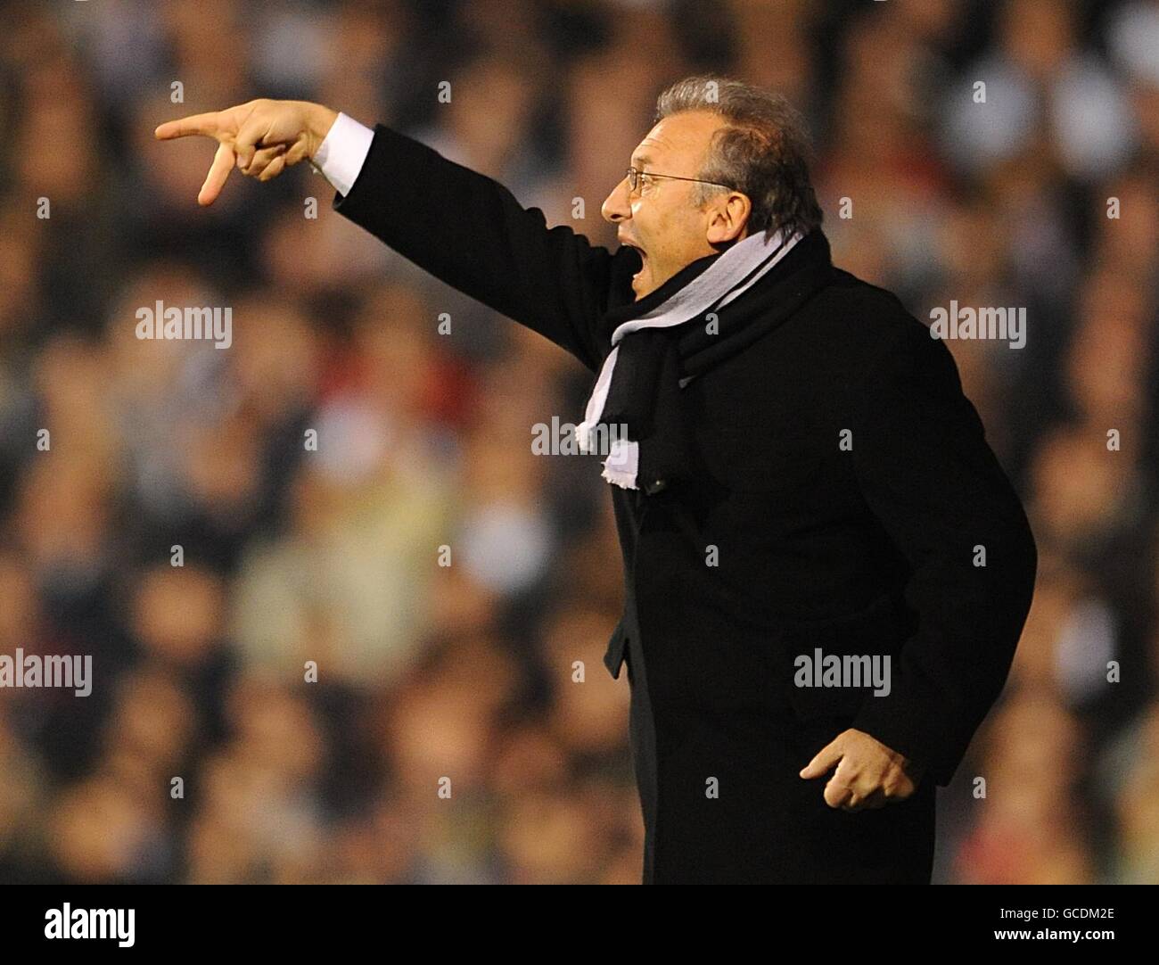 Juventus manager Alberto Zaccheroni gestures and shouts from the touchline. Stock Photo