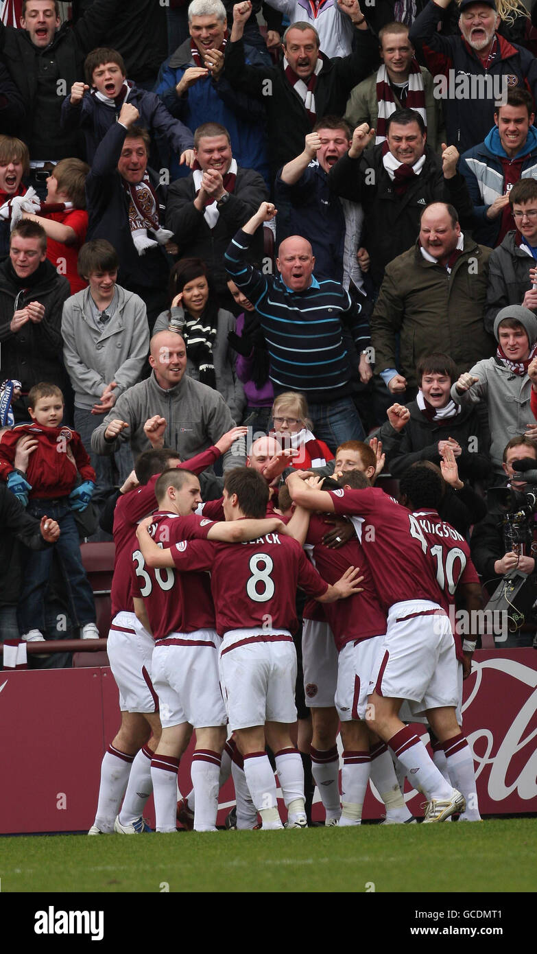 Heart of Midlothian's Andrew Driver (hidden) celebrates scoring the ...