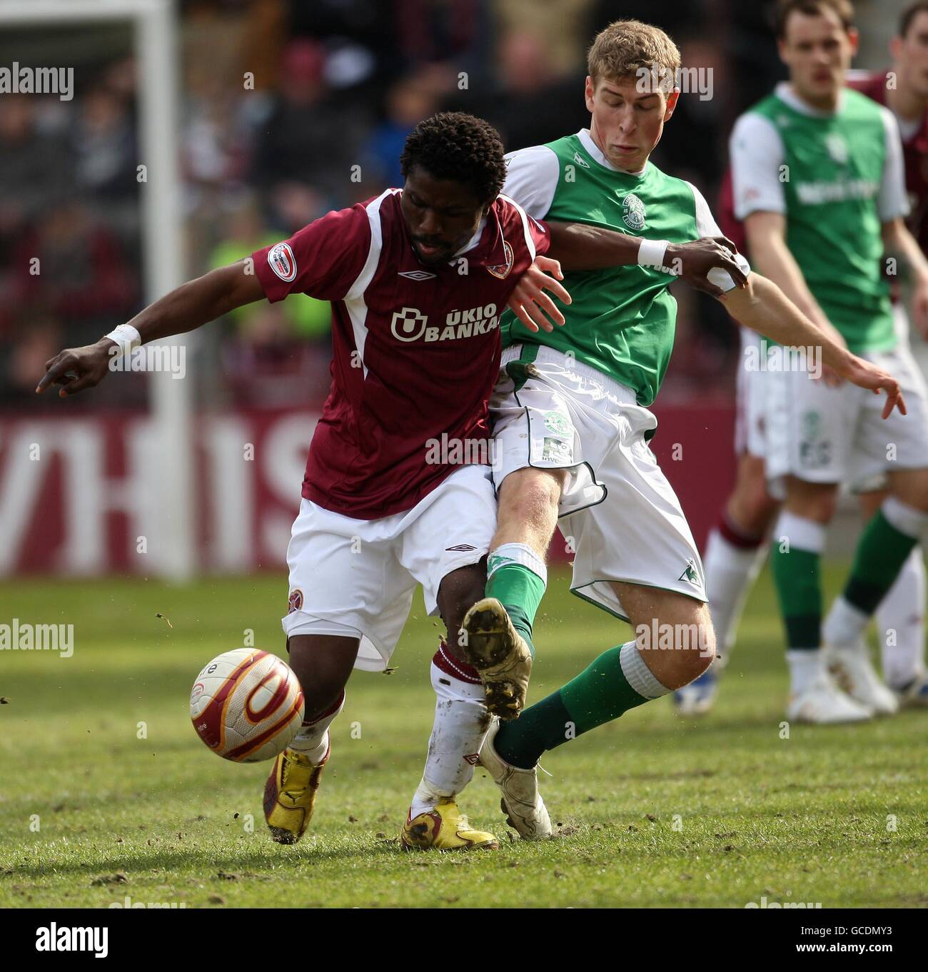 Hearts Larry Kingston and Hibernian's David Wotherspoon during the Clydesdale Bank Premier League match at Tynecastle Stadium, Edinburgh. PRESS ASSOCIATION. Picture date: Saturday March 20, 2010. See PA story SOCCER Hearts. Photo credit should read: Lynne Cameron/PA Wire. Stock Photo