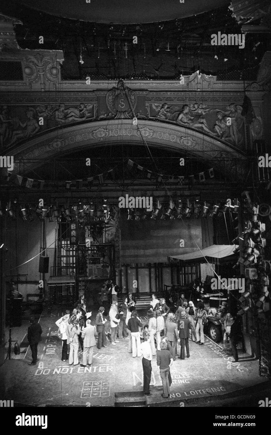 London's Shaftesbury Theatre - where the 200th performance of the hit musical was due to have been staged tomorrow, was closed after part of the ceiling plasterwork fell on the stage and the audience stalls. Sorrowful cast members are pictured on stage this afternoon after their matinee performance was cancelled. Stock Photo