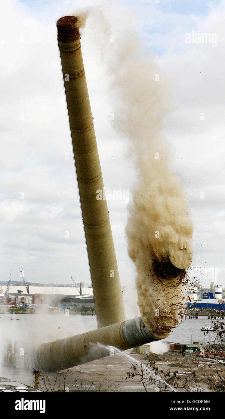 ALTERNATE CROP Two 550ft chimneys, which have dominated the Gravesham skyline for 40 years, come crashing down at Lafarge Cement's Northfleet site in Kent, marking the end of nearly 200 years of cement production at the site. Stock Photo