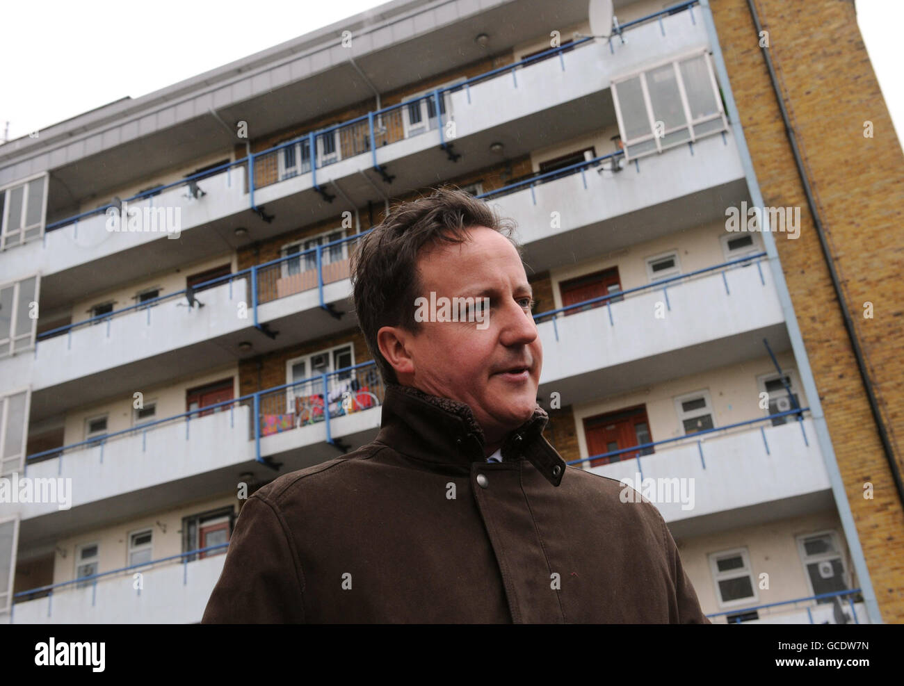 Conservative Party leader David Cameron visits the Ocean Estate in Stepney, east London where he was shown around by 'London Citizens' Shahin Ahmed and Matthew Bolton who are trying to improve the estate for local residents. Stock Photo