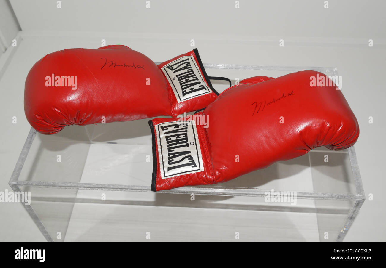 Boxing gloves, used and signed by Muhammad Ali on display at NY