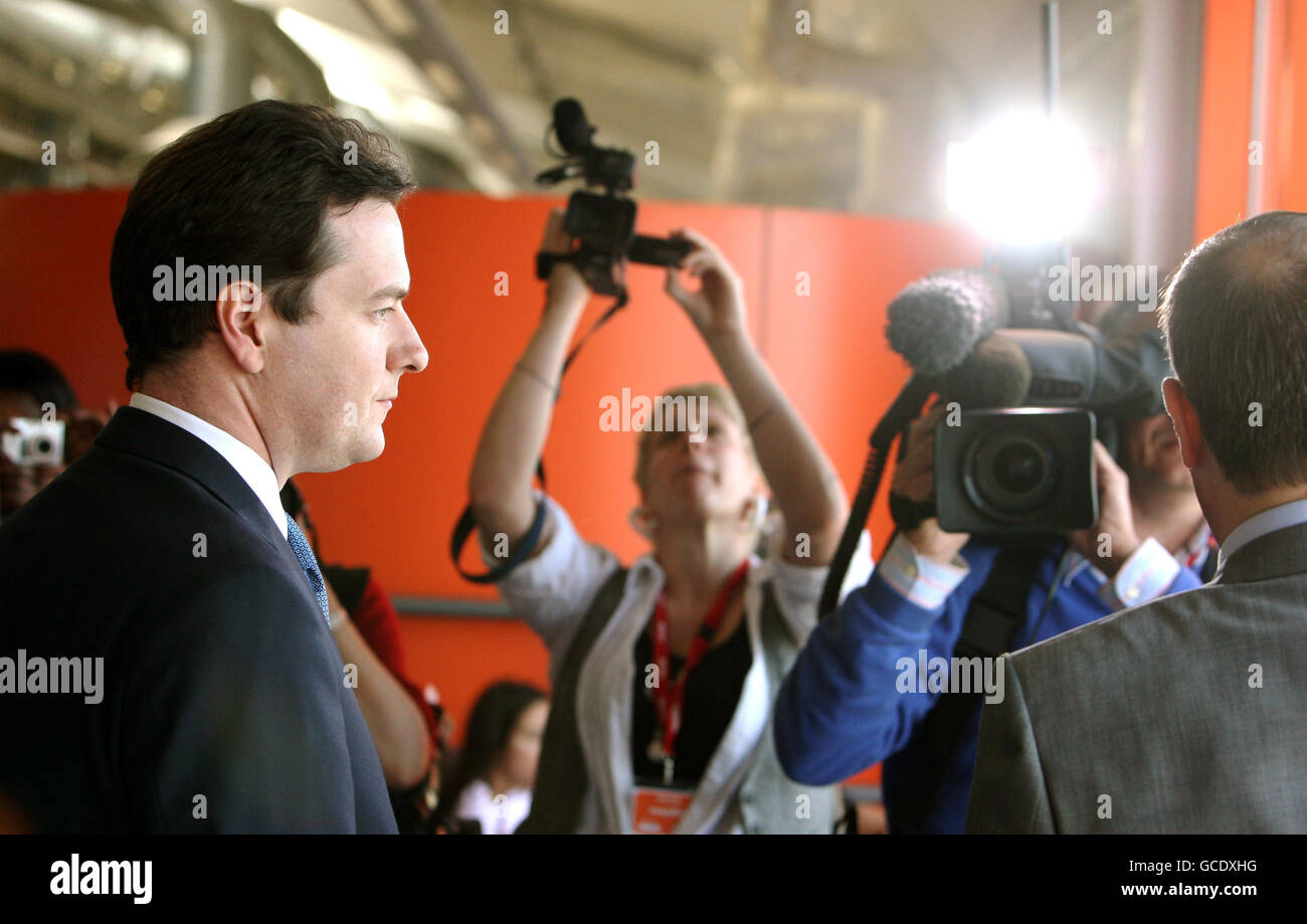 Shadow Chancellor George Osborne speaks to the media during a visit to the headquarters of Easyjet, at Luton Airport, Bedfordshire, while on general election campaign trail. Stock Photo