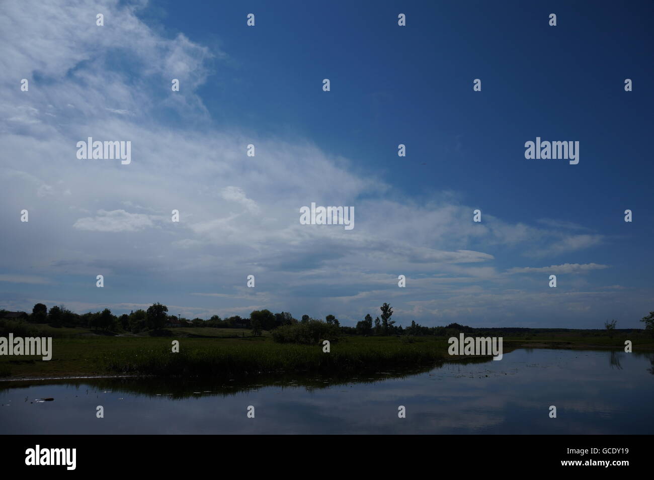 landscape with mountains trees and a river in front Stock Photo - Alamy