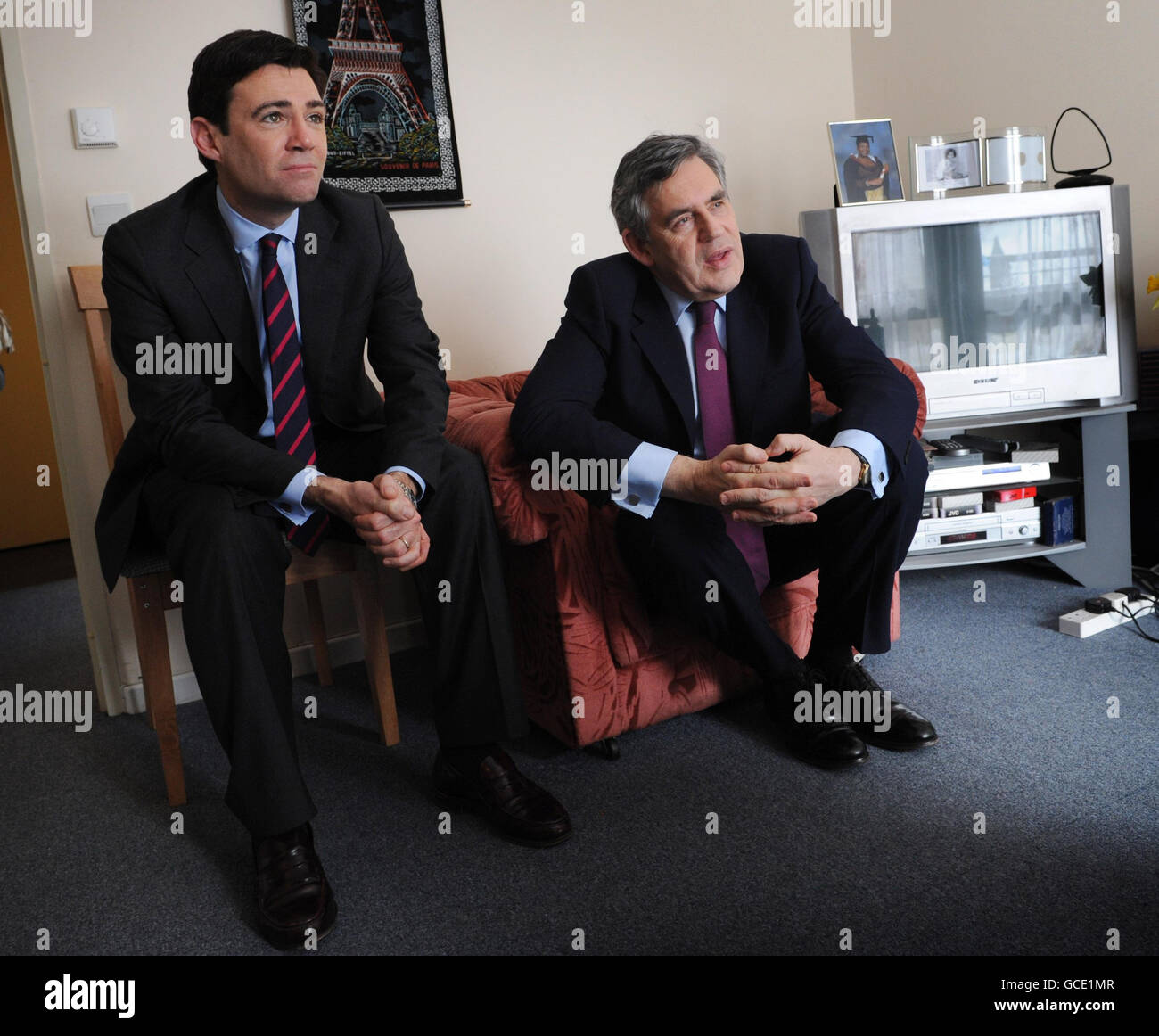 Prime Minister Gordon Brown and Health Secretary Andy Burnham (left) when they visited Sylvia Thomas, 81, in her social housing flat at Lingham Court in Stockwell, south London to highlight the government's social care announcement. Stock Photo