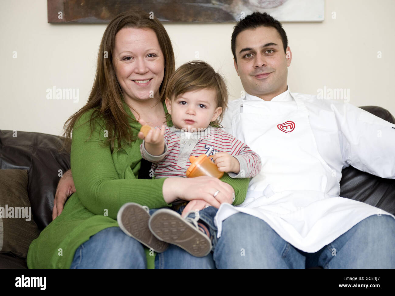 MasterChef winner Dhruv Baker, 34, with wife Aileen and son, 20 month-old Arunat, at his home in south London. Stock Photo