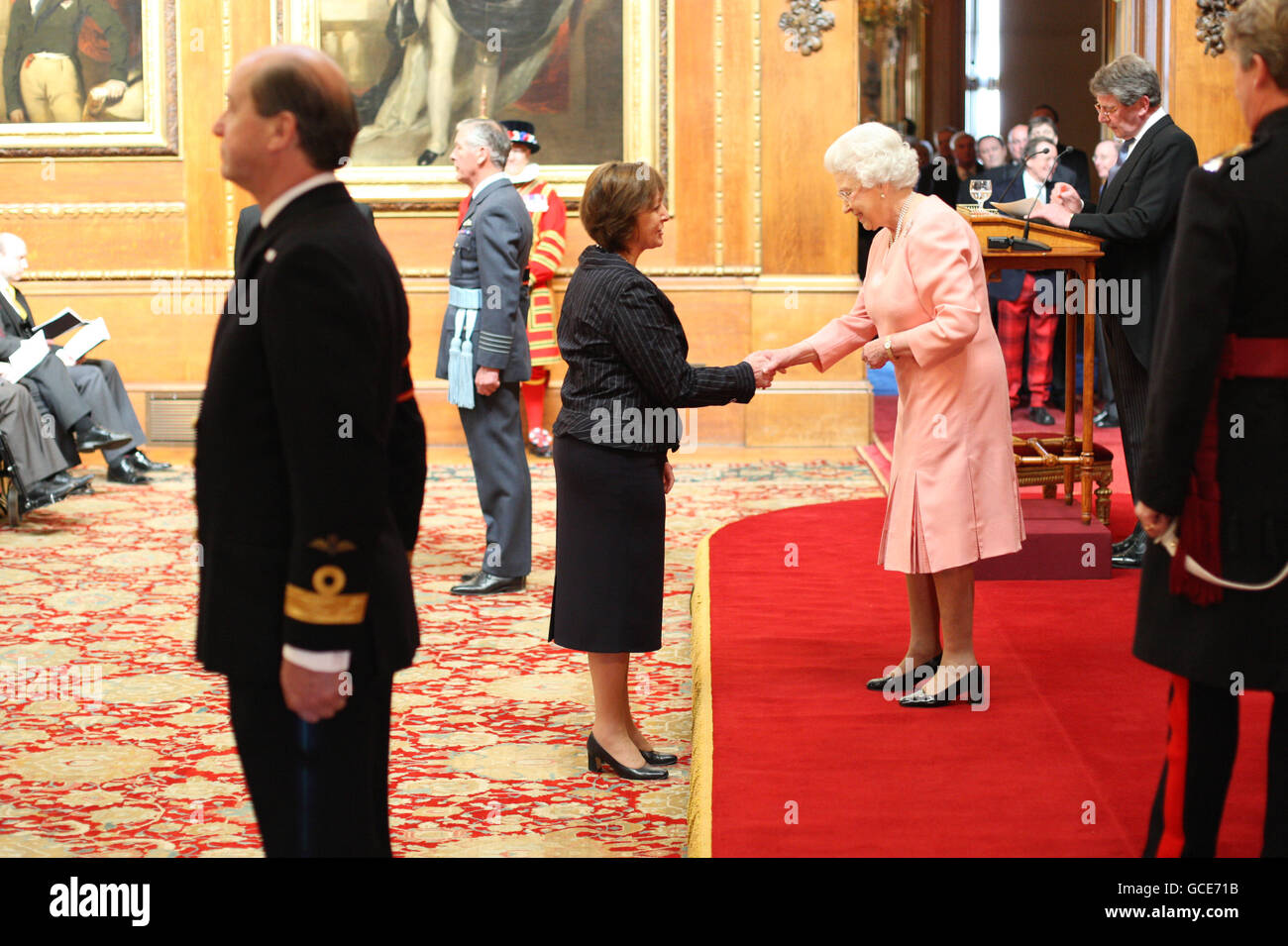 Bethan Guilfoyle from Pontyclun is made a CBE by The Queen at Windsor Castle. Press Association Photo. Stock Photo