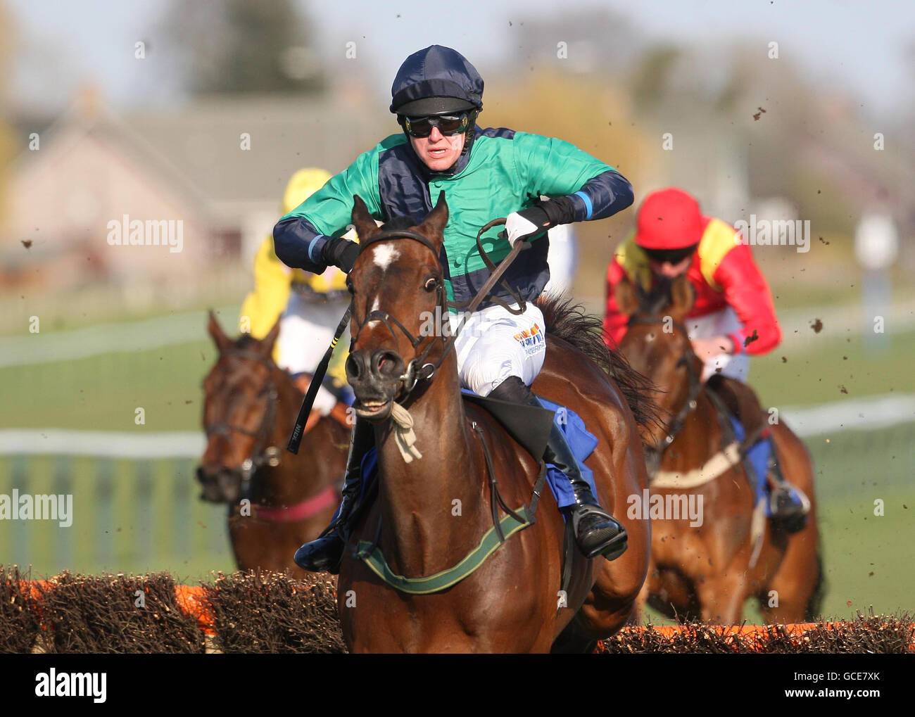 Ramsden Boy (centre) ridden by Nick Scholfield wins The West Sound Conditional Jockeys' Handicap Hurdle during the Coral Scottish Grand National Festival at Ayr Racecourse, Ayr. Stock Photo