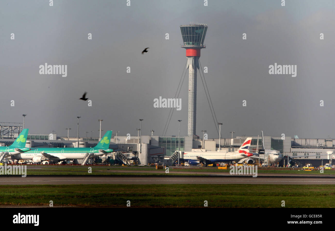 Volcanic ash causes travel disruption. Note: Picture shot through fence. Quiet at Heathrow Airport as Volcanic ash has closed UK Airspace. Stock Photo