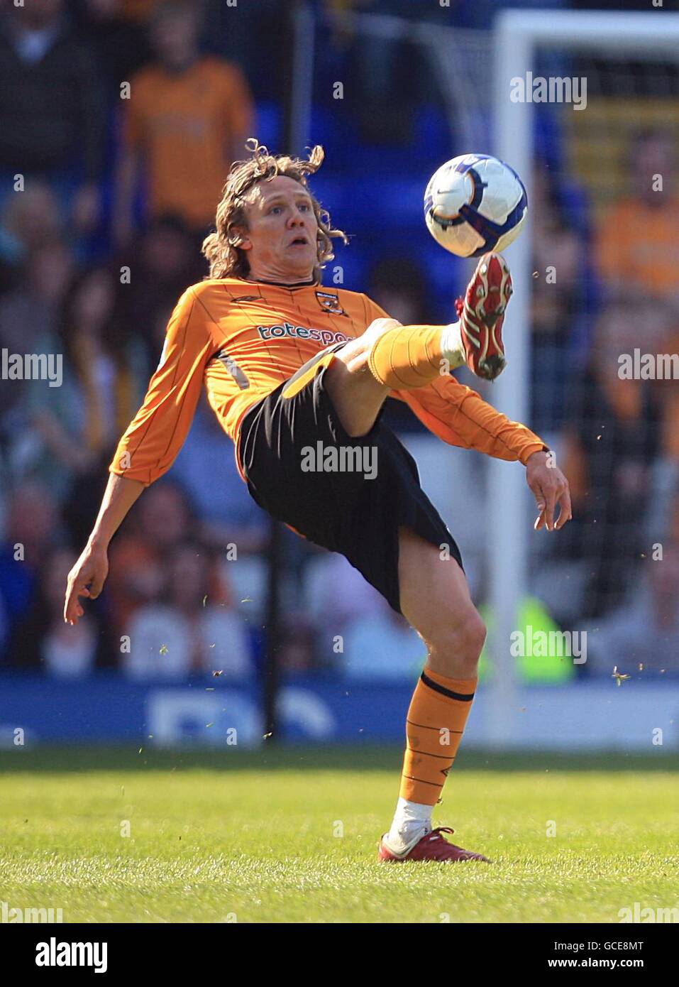 Soccer - Barclays Premier League - Birmingham City v Hull City - St Andrews' Stadium. Hull City's Jimmy Bullard kicks the ball over his head. Stock Photo