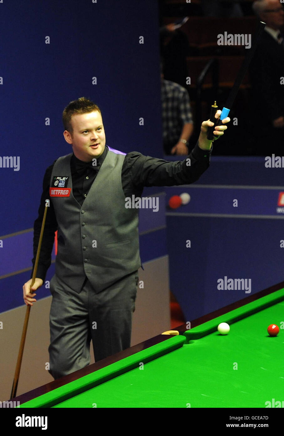 England's Shaun Murphy celebrates winning his first round match against