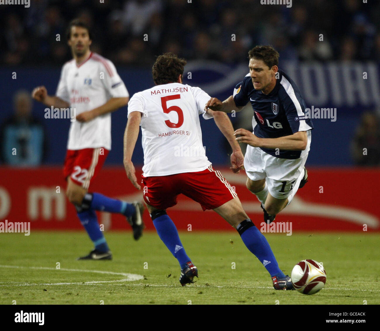 Fulham's Zoltan Gera (right) in action with Hamburg's Joris Mathijsen during the Europa League Semi Final match at the HSH Nordbank Arena, Hamburg, Germany. Stock Photo