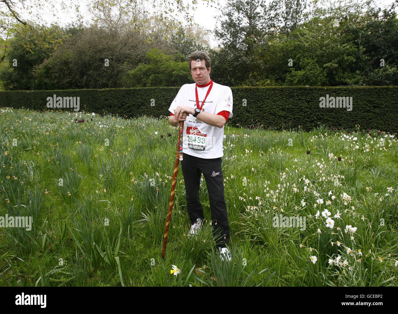 Major Phil Packer, who suffered a spinal cord injury serving in Basra, Iraq, after completing the 2010 Virgin London marathon, at The Mall, London. Stock Photo