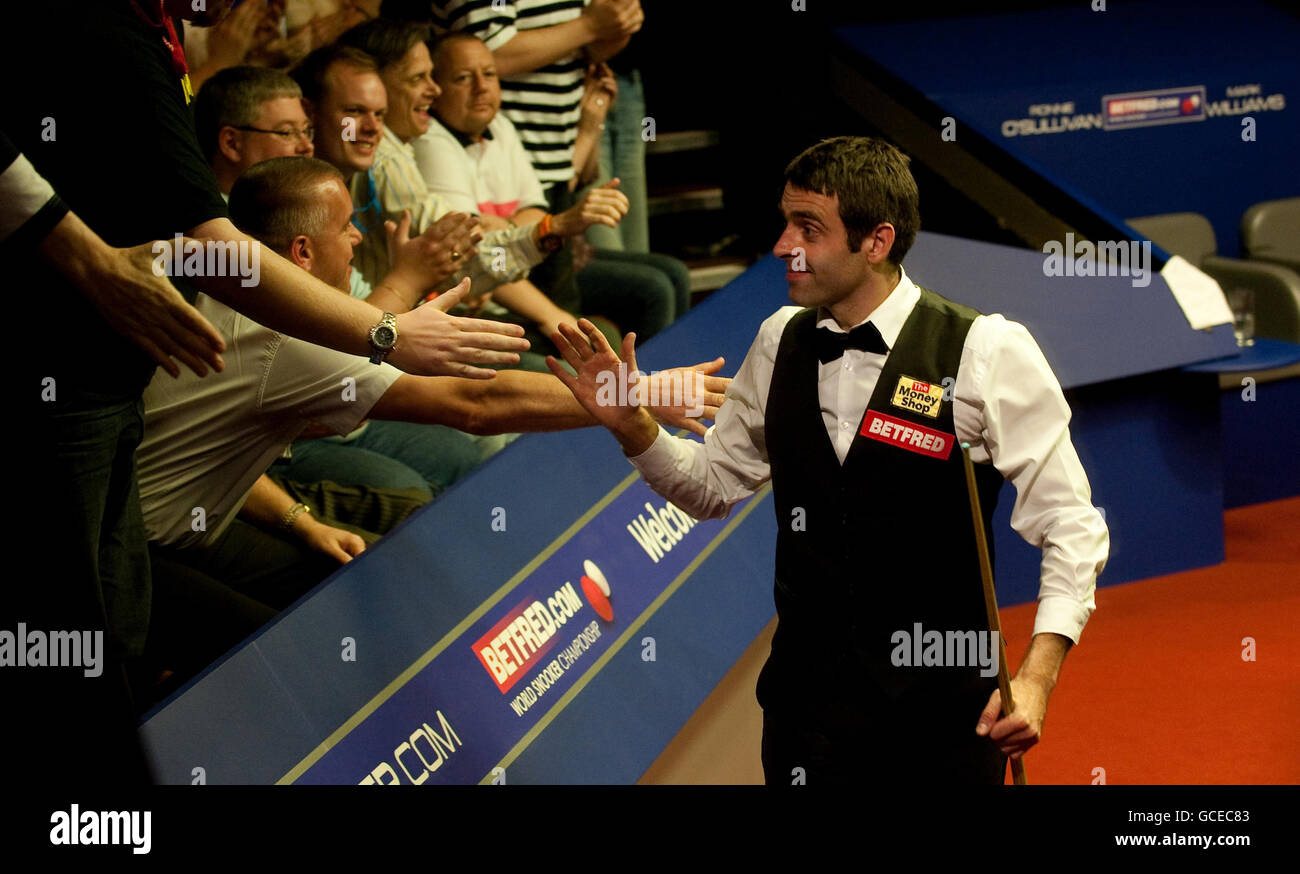 Ronnie O'Sullivan celebrates beating Mark Williams during their second