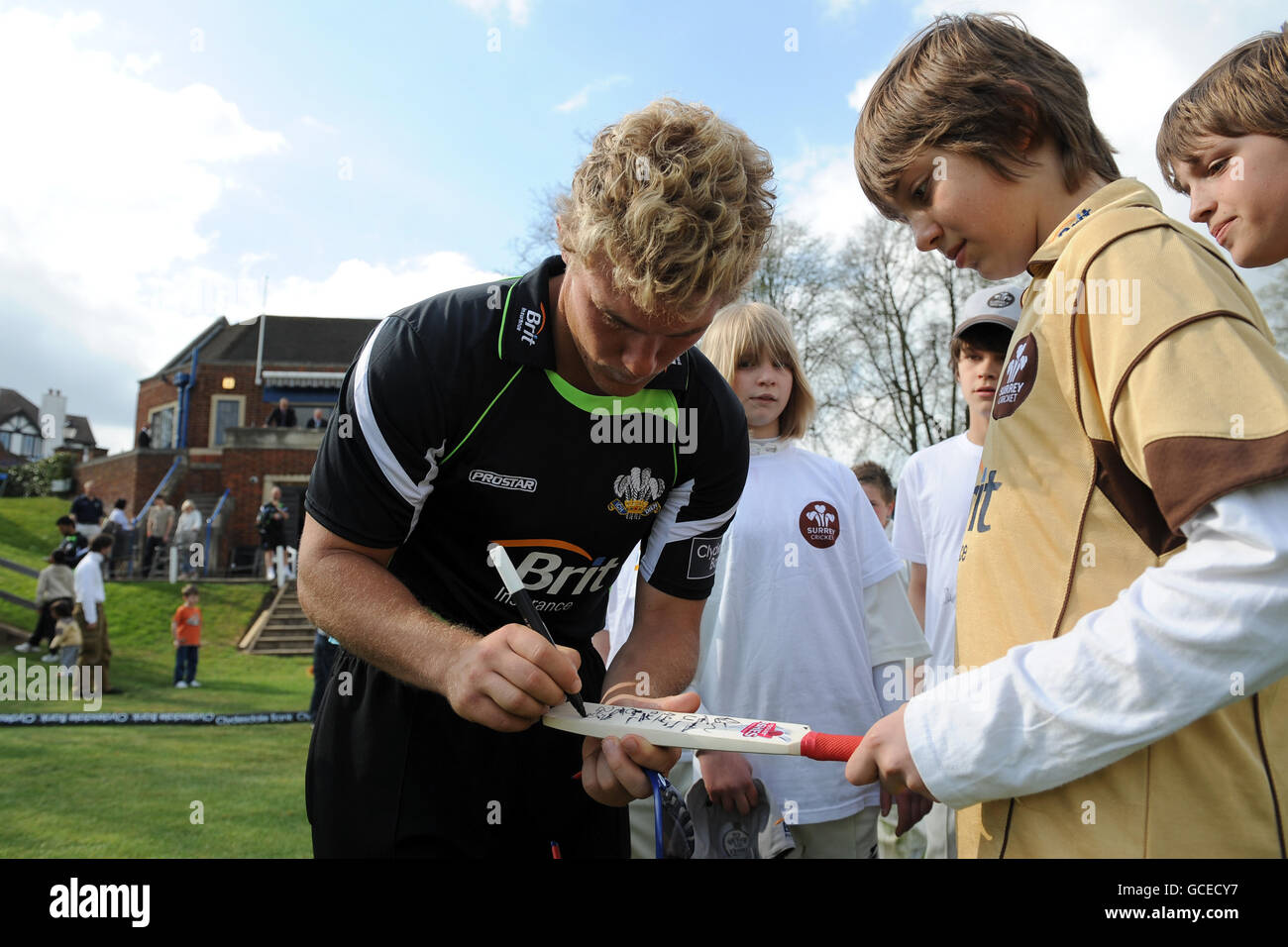 Surrey captain Rory Hamilton-Brown signs autographs for young fans Stock Photo