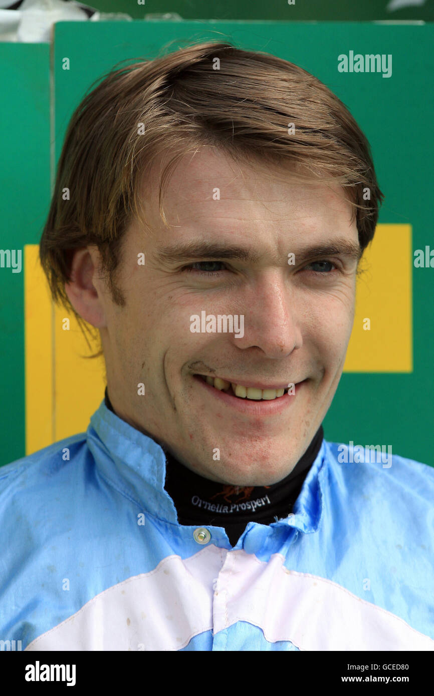 Horse Racing - The bet365 Gold Cup Meeting - Day Two - Sandown Park. Jockey Tom Scudamore after victory on I'm So Lucky in The bet365.com Celebration Steeple Chase Stock Photo