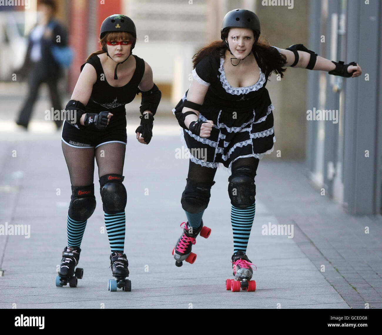 Left to Right) Eillise O'Sullivan (aka Alice Enrage) and Vivian Coyle (aka  Belladonna Blitzin) of the Dublin Roller Girls Roller Derby Team at their  launch in Dublin this weekend Stock Photo -