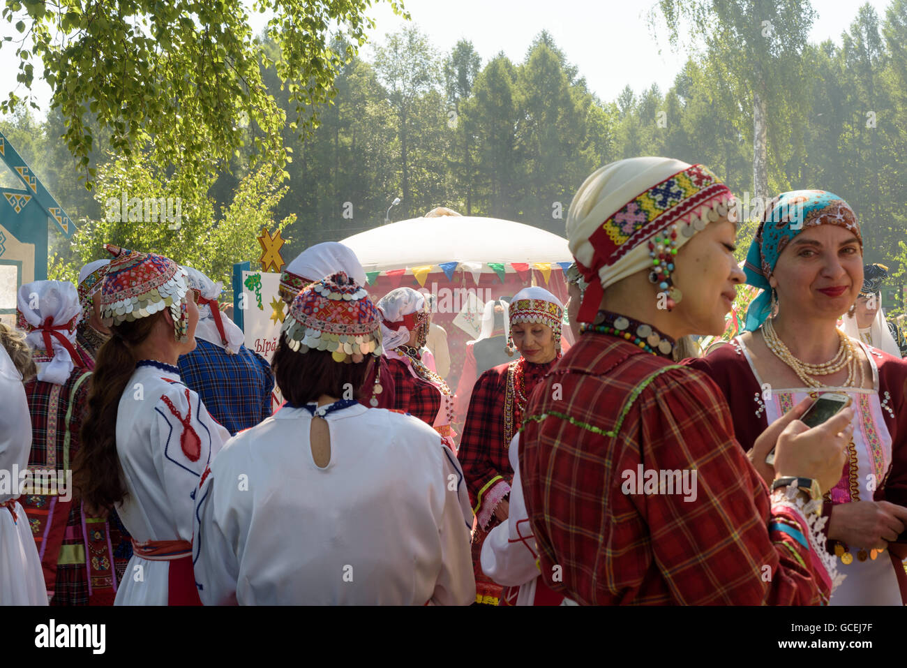 Russians celebrate Sabantuy by wearing Bashkir and Tartar ethnic traditional dresses and costumes Stock Photo