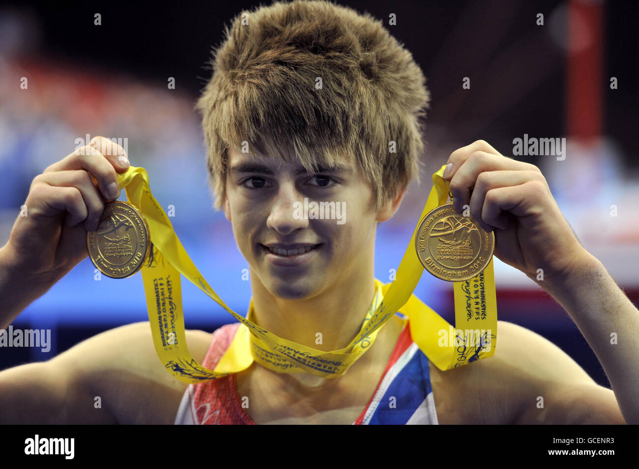 Great Britain's Max Whitlock poses after winning gold on the floor and pommel horse during the Individual Apparatus Final during the European Artistic Championships at the NIA, Birmingham. Stock Photo