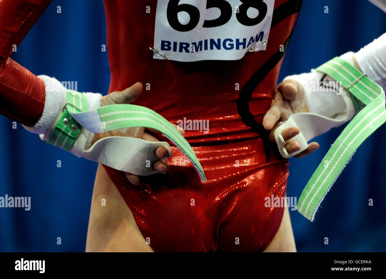 A gymnast wears wrist guards during the Women's Junior Qualification of the European Gymnastics